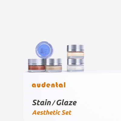 Equipamento de laboratório dentário com sistema de coloração para textura de superfície realista e esmalte brilhante em restaurações dentárias